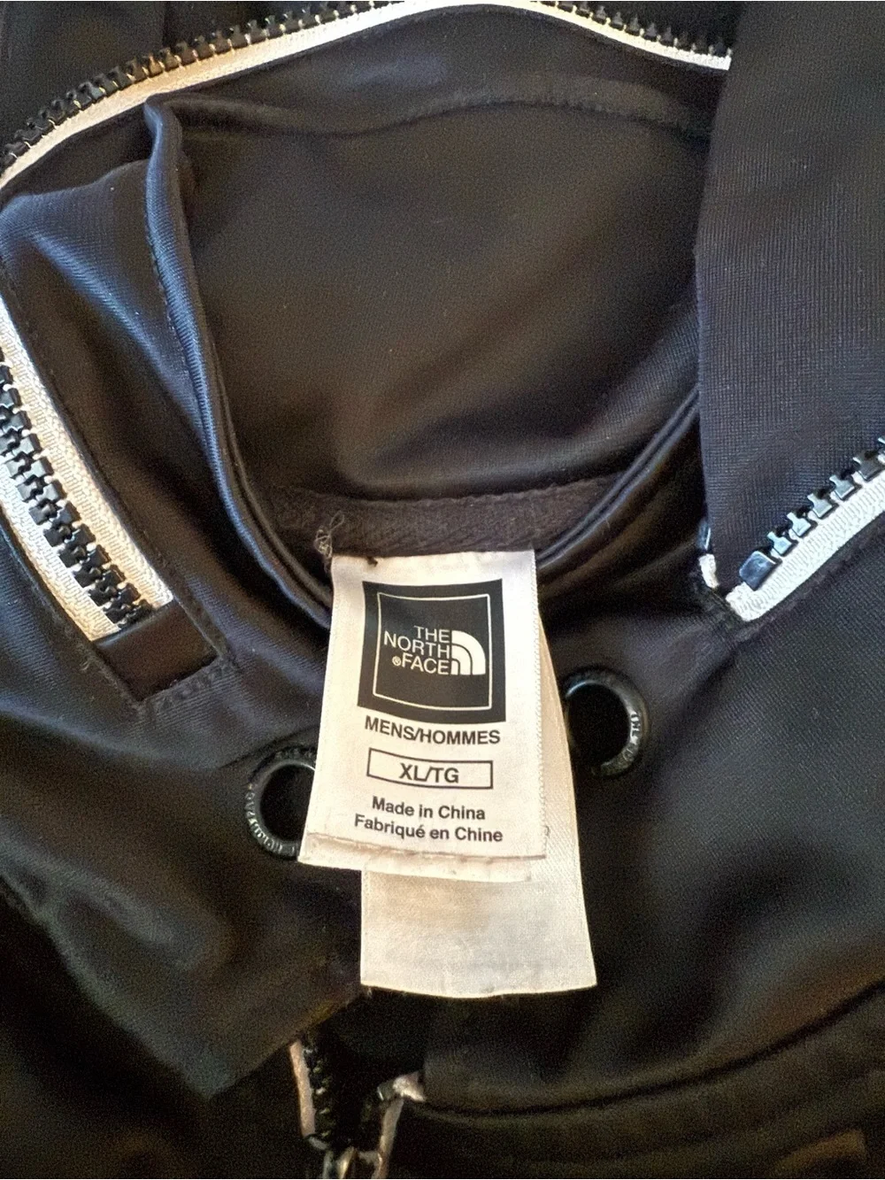 The North Face Black Jacket with Red Logo Patch